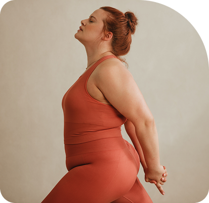 plus size woman doing yoga